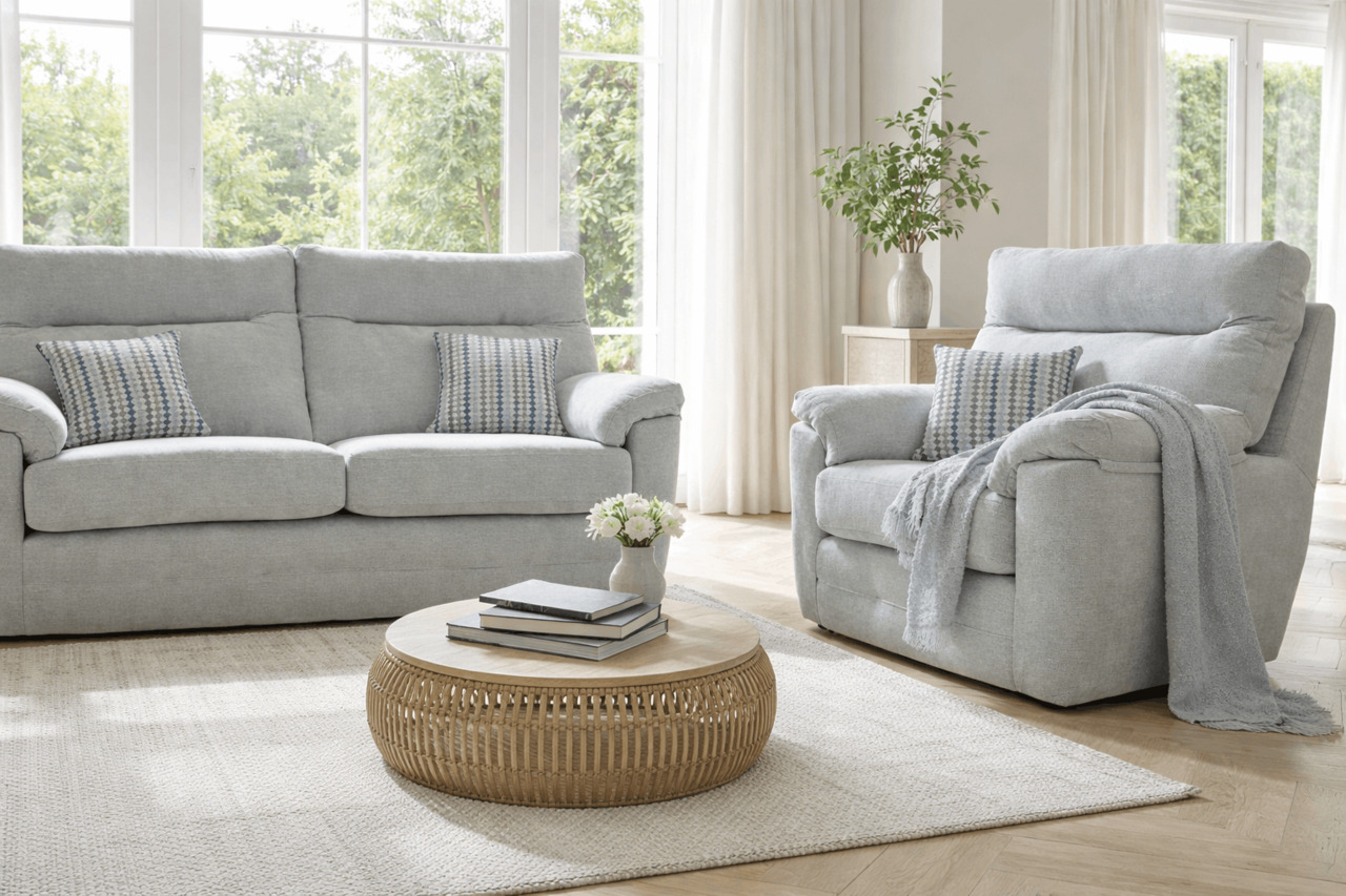 Light grey sofa and armchair in bright living room