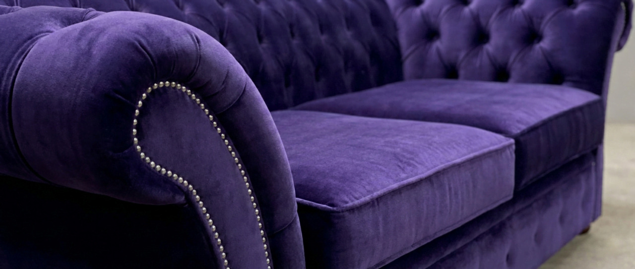 Purple velvet Chesterfield sofa close-up
