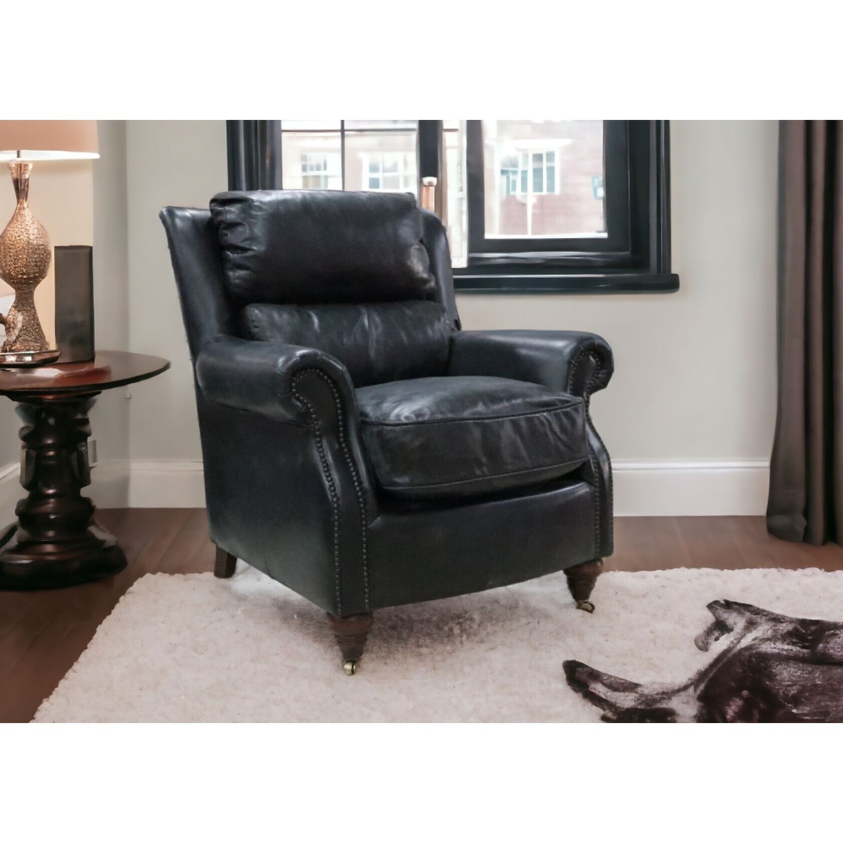 Black leather online armchair with ottoman