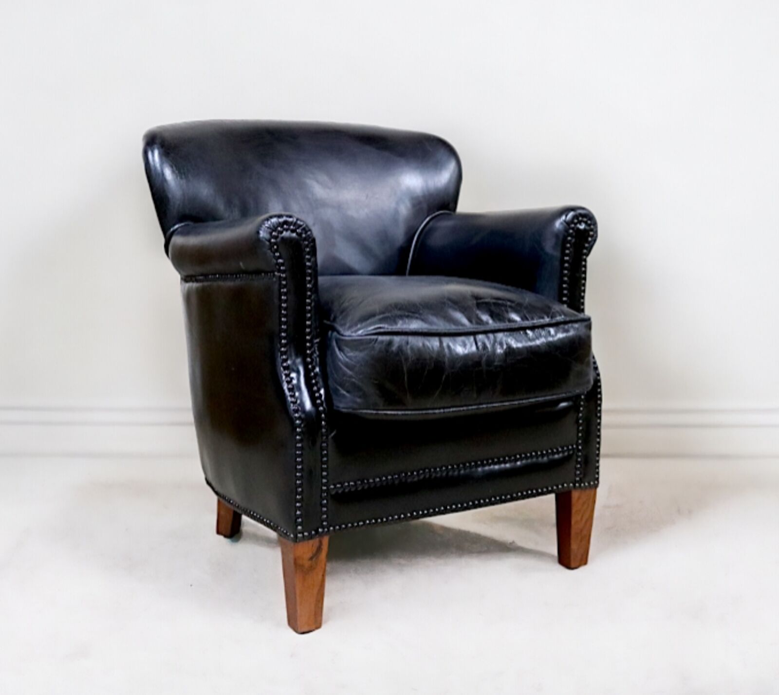 Product photograph of Professor Vintage Black Distressed Real Leather Armchair from Designer Sofas 4U