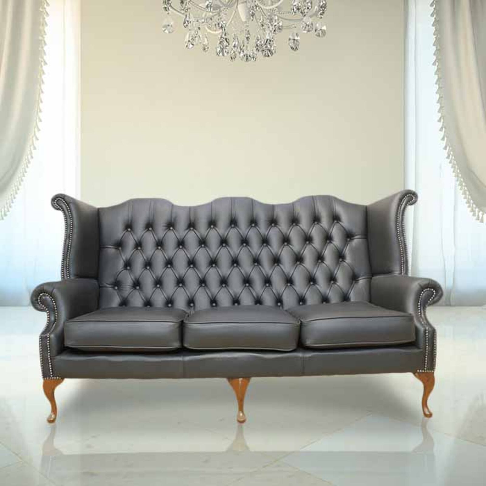 Product photograph of Chesterfield 3 Seater Queen Anne High Back Wing Chair Uk Manufactured Black from Designer Sofas 4U