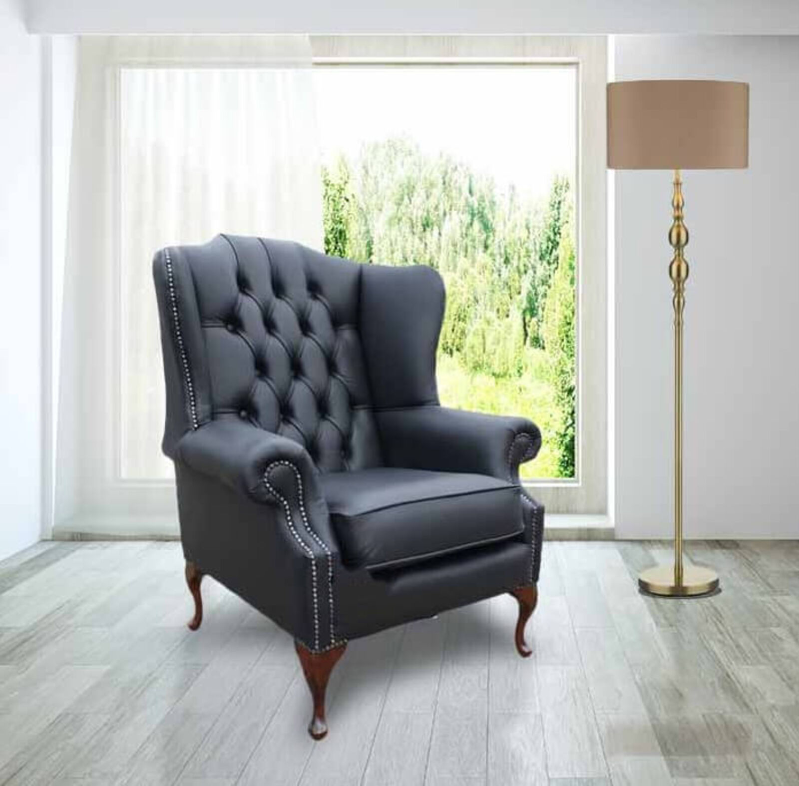 Product photograph of Chesterfield Mallory Flat High Back Wing Chair Bonded Black Real Leather from Designer Sofas 4U