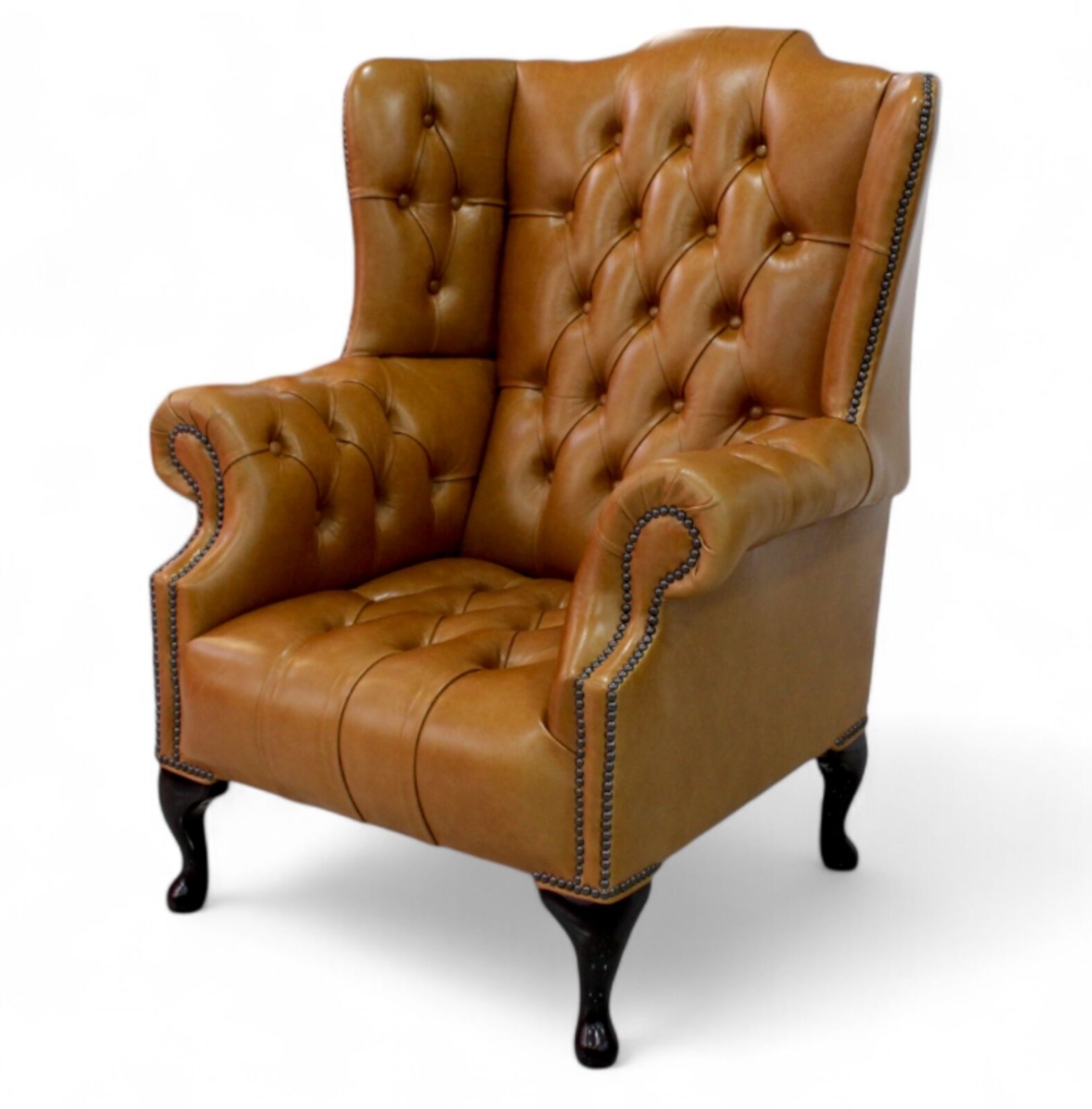 Product photograph of Chesterfield Oxford High Back Wing Chair Uk Manufactured Old English Tan from Designer Sofas 4U