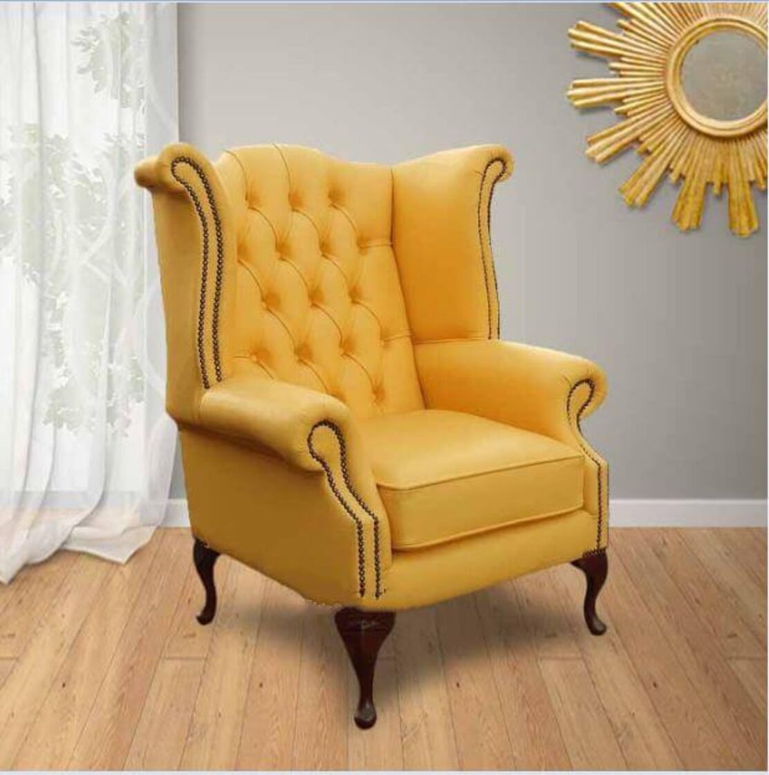 yellow wingback armchair