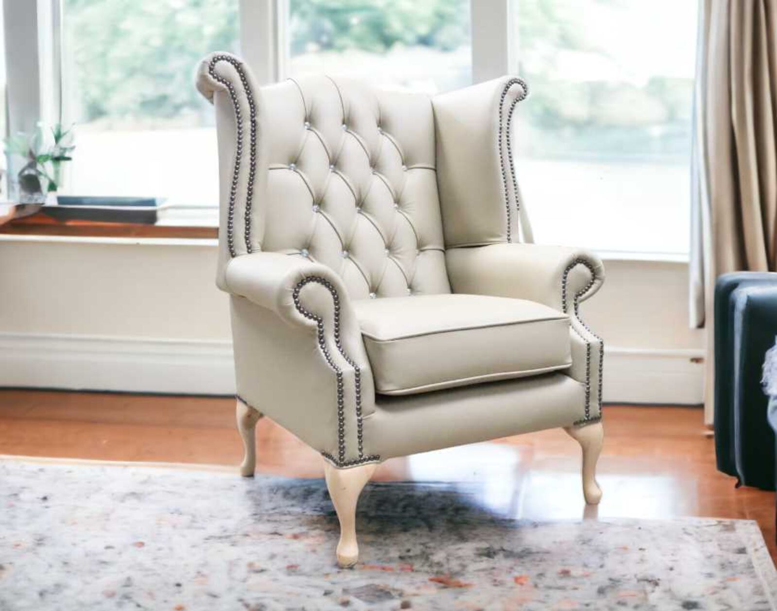 Product photograph of Chesterfield Crystal Queen Anne High Back Wing Chair Shelly Pebble Leather from Designer Sofas 4U