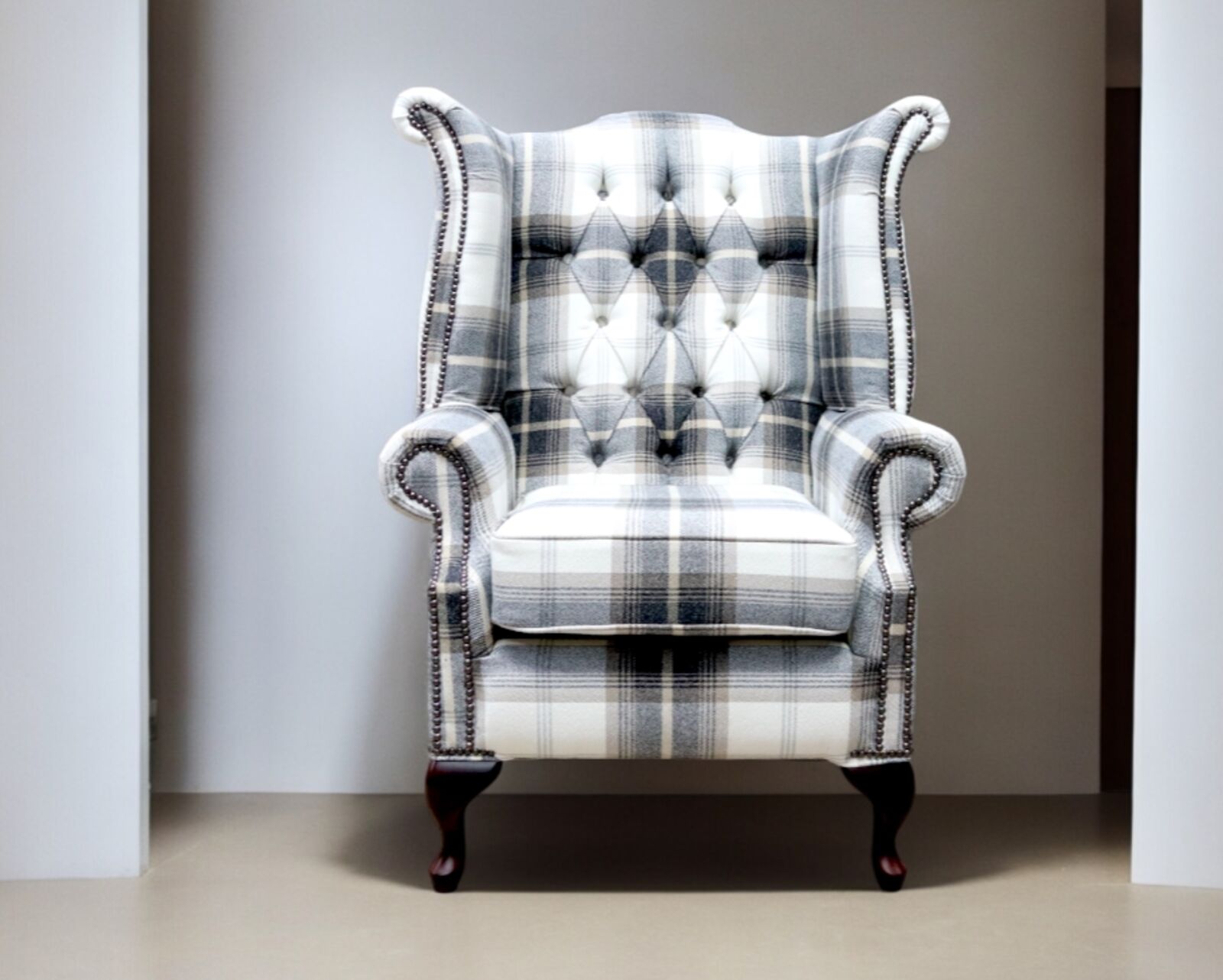 Product photograph of Chesterfield Prince S Queen Anne High Back Wing Chair Balmoral Charcoal Check P Amp S Fabric from Designer Sofas 4U