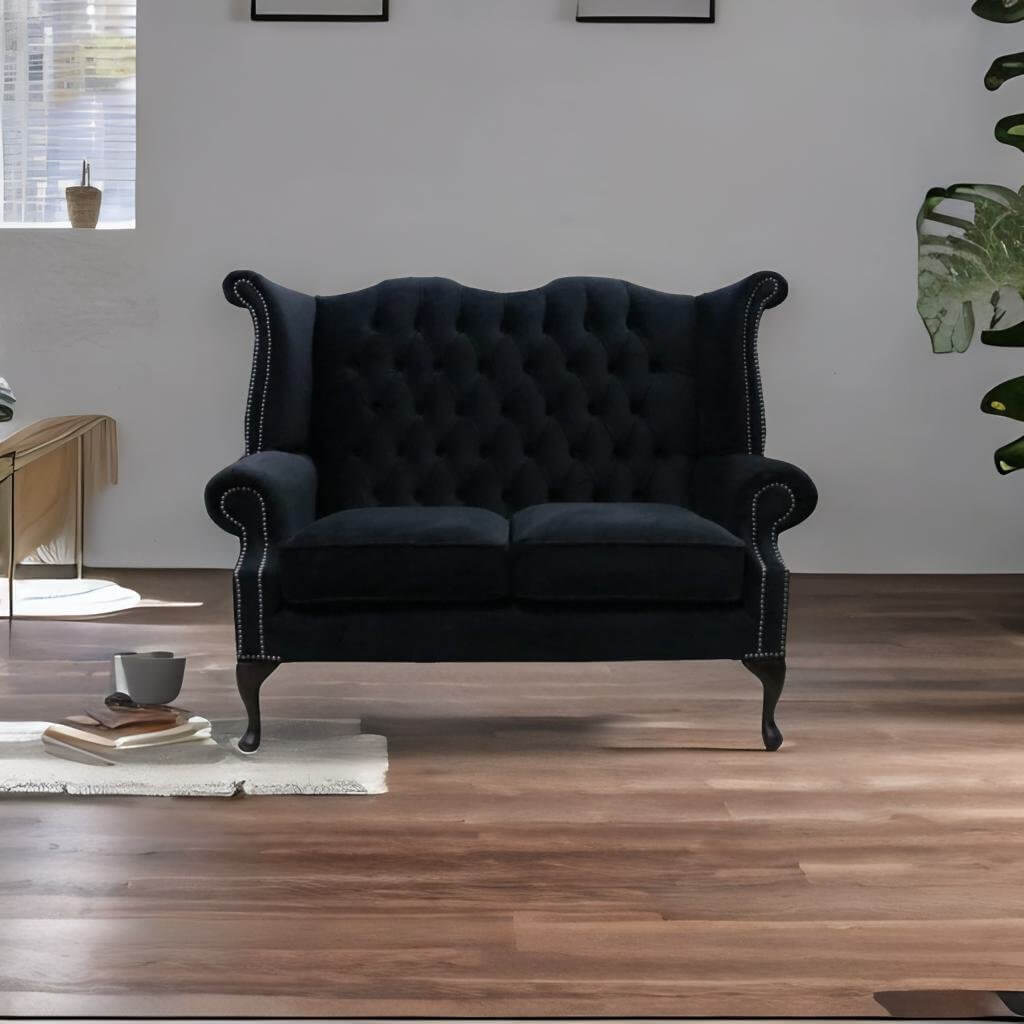 Black velvet 2024 tufted sofa