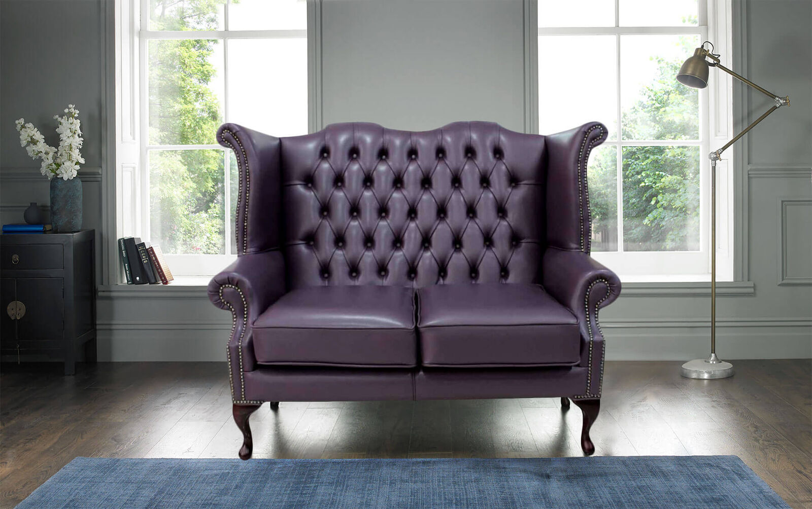 Product photograph of Chesterfield 2 Seater Queen Anne High Back Wing Sofa Hemmingway Blueberry Leather from Designer Sofas 4U