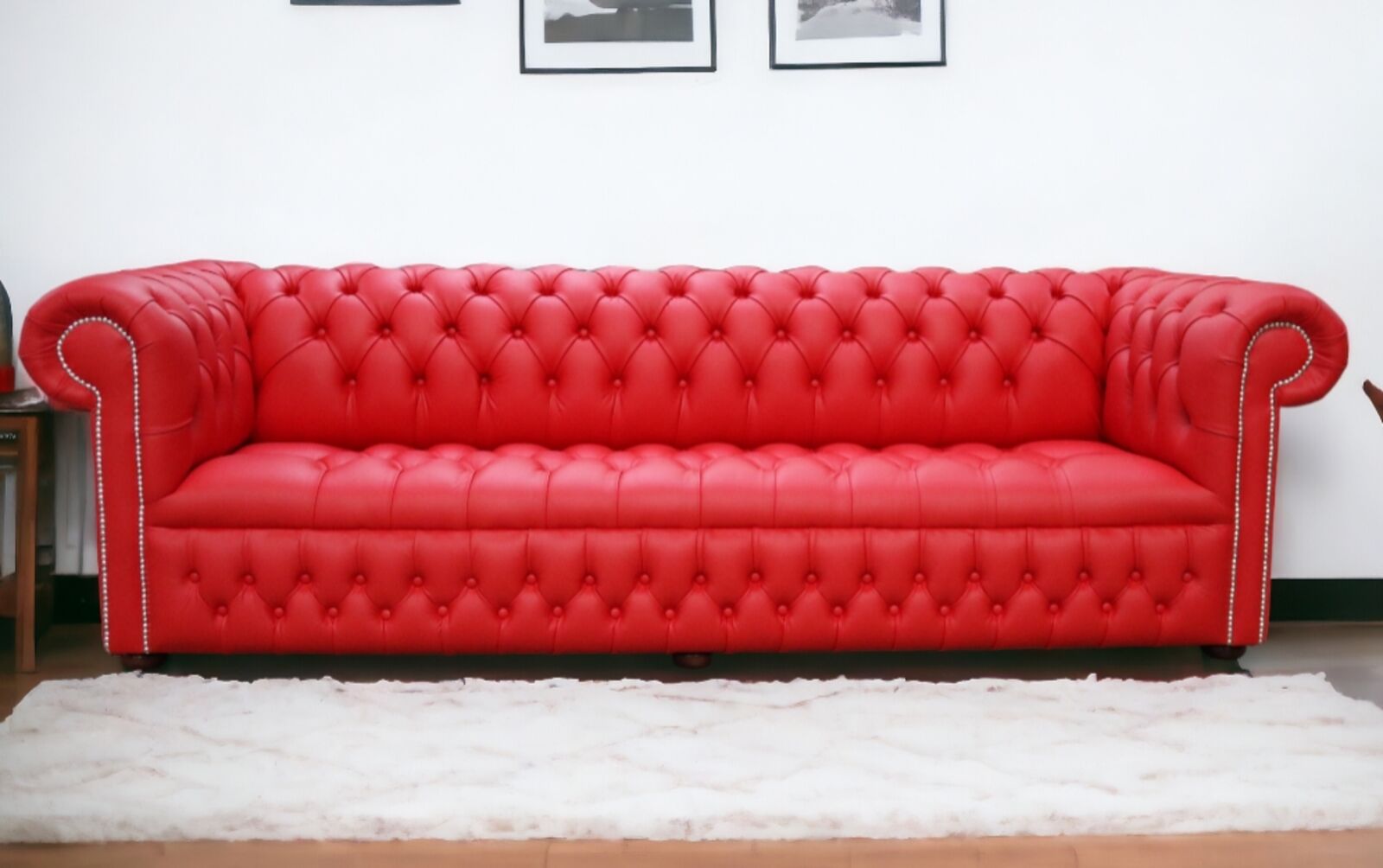 Product photograph of Chesterfield 4 Seater Settee Buttoned Seat Shelly Flame Red Leather Sofa Stock from Designer Sofas 4U