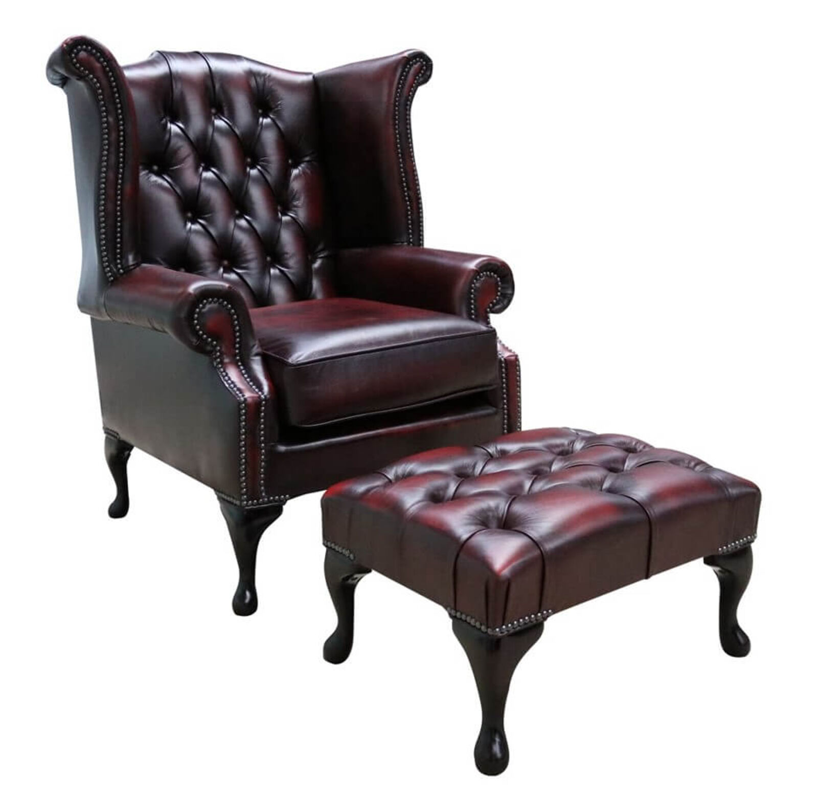 Product photograph of Rub Off Antique Oxblood Red Leather Chesterfield Georgian Queen Anne Wing Chair Footstool Designersofas4u from Designer Sofas 4U