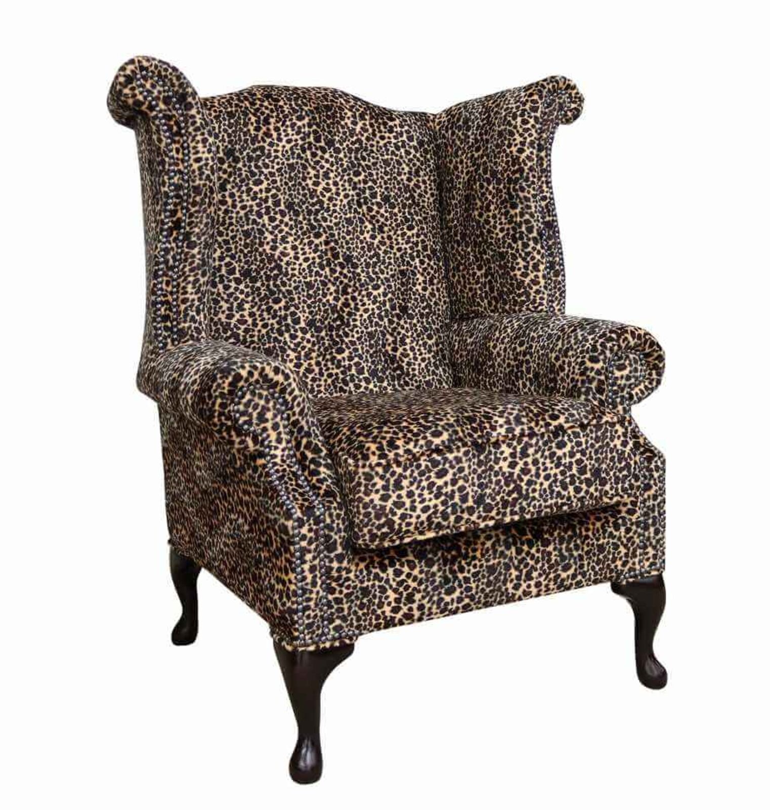 Product photograph of Chesterfield Saxon Queen Anne High Back Wing Chair Sand Leopard Animal Print Fabric from Designer Sofas 4U