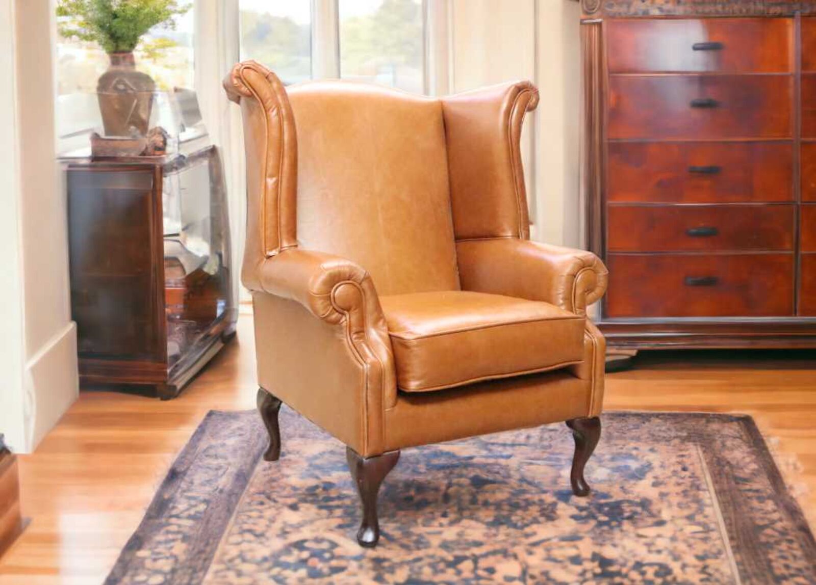 Product photograph of Chesterfield Queen Anne Buttonless Old English Bruciato Leather Armchair from Designer Sofas 4U