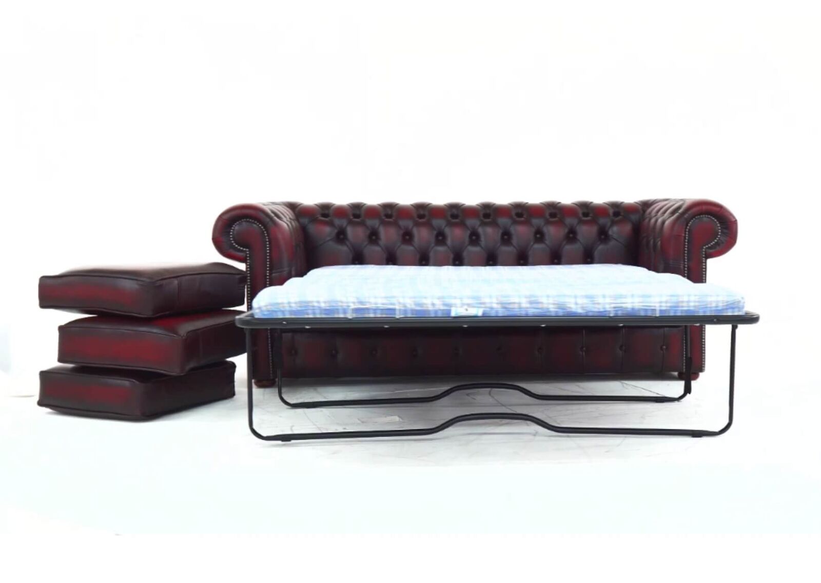 Product photograph of Pull Out Sofa Bed In Chesterfield 3 Seater Antique Oxblood Red Leather from Designer Sofas 4U