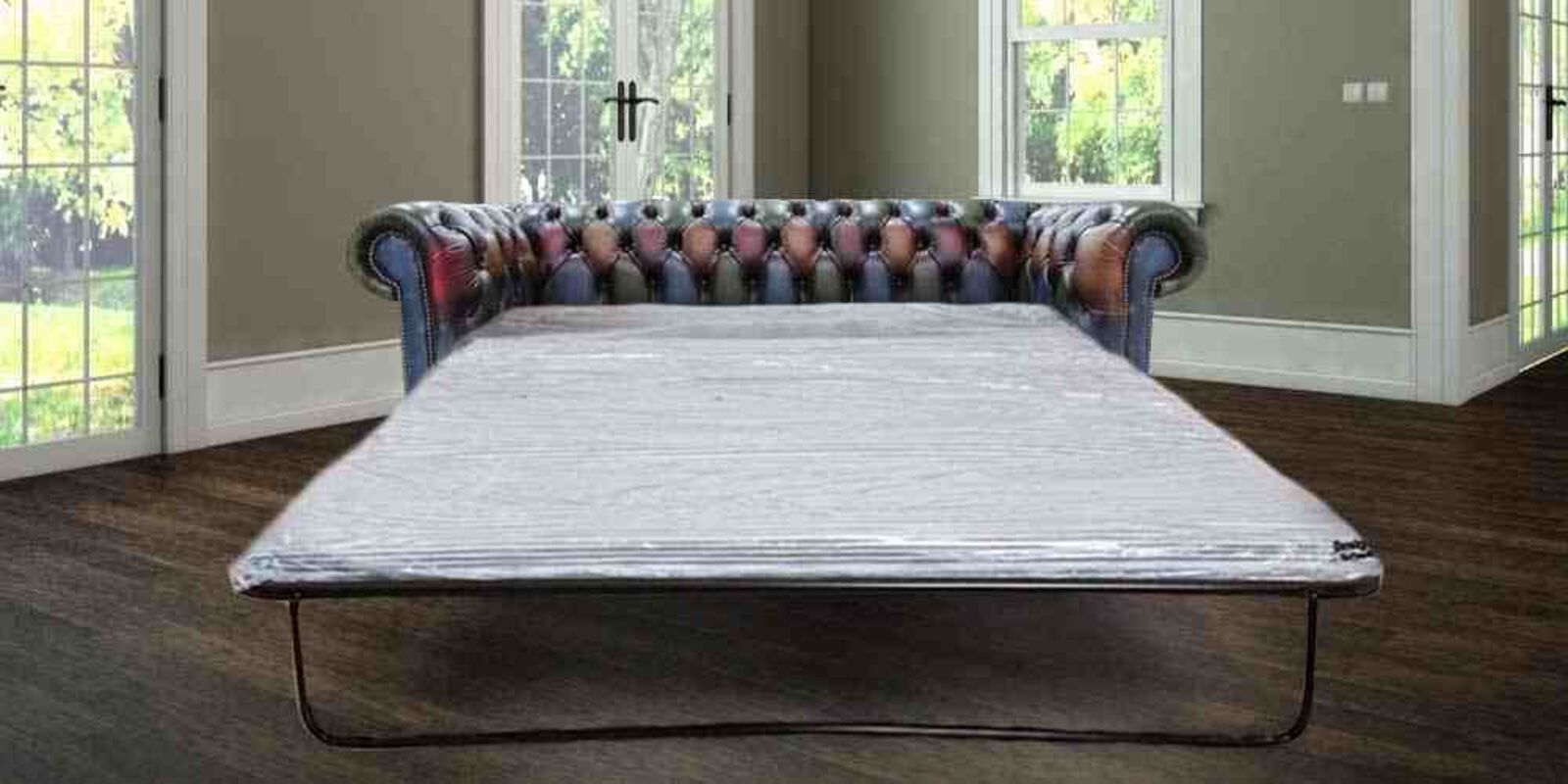 Product photograph of Chesterfield Pull Out Sofa Bed In Patchwork 3 Seater Antique Real Leather from Designer Sofas 4U