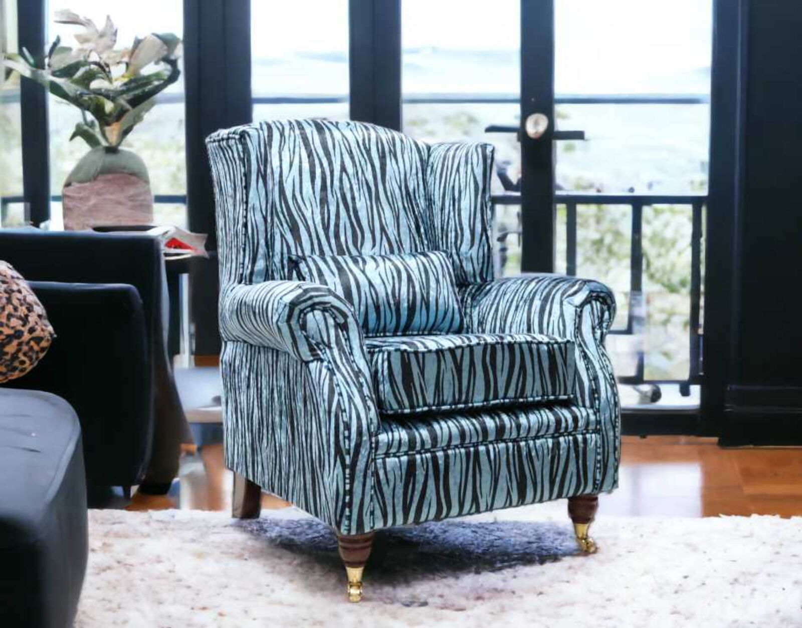 Product photograph of Wing Chair Fireside High Back Armchair Zebra Aqua Animal Print Fabric from Designer Sofas 4U
