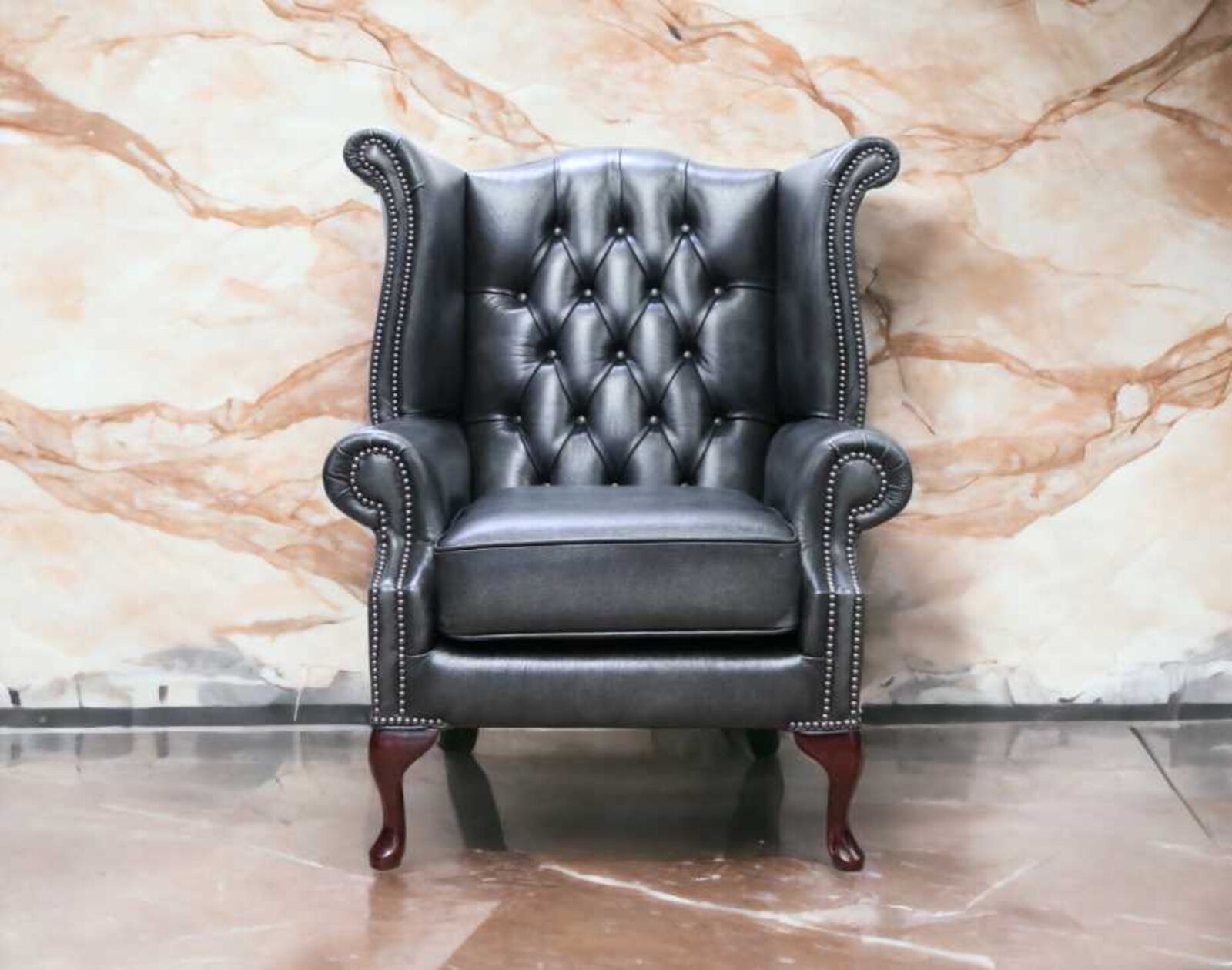 Product photograph of Chesterfield Queen Anne High Back Wing Chair Antique Grey Leather from Designer Sofas 4U