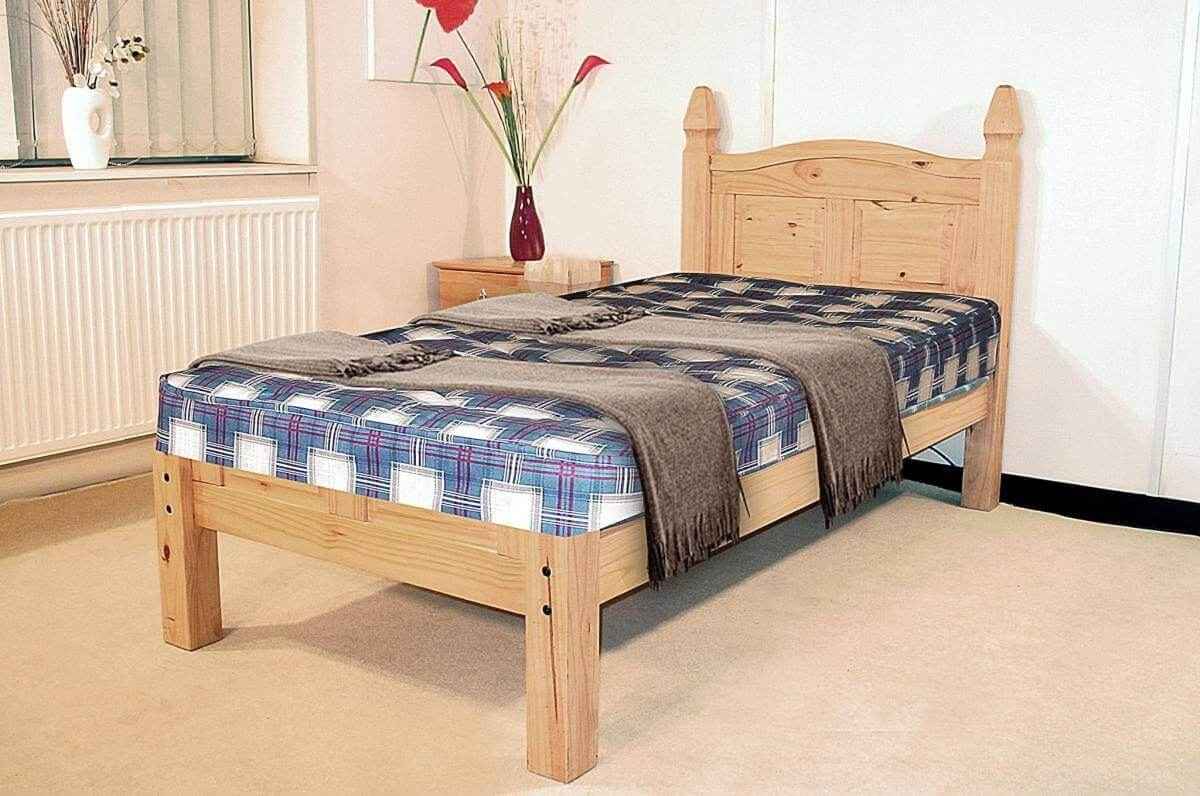 wooden single bed with mattress