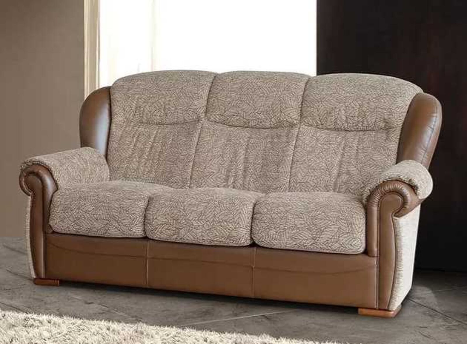 Product photograph of Sorrento 3 Seater Genuine Italian Leather And Fabric Sofa from Designer Sofas 4U